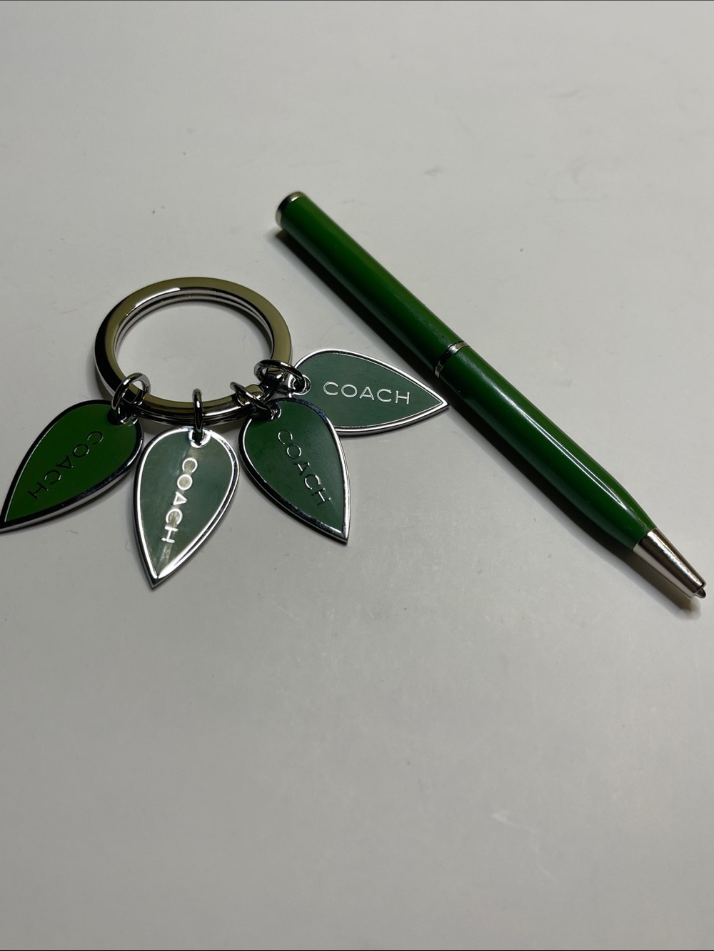 COACH Green Enamel Leaf Keyring and Coach Pen - Picture 1 of 7